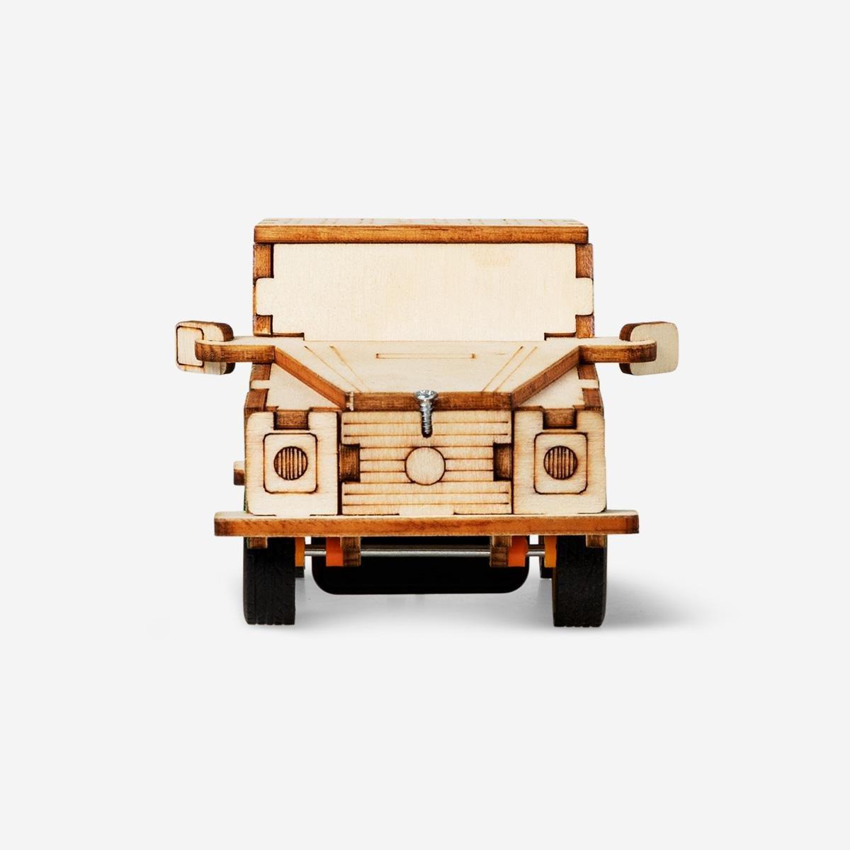 Brown wooden paint-your-own car. drives when you clap