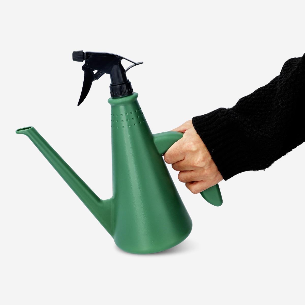 Green watering can. with mist spray