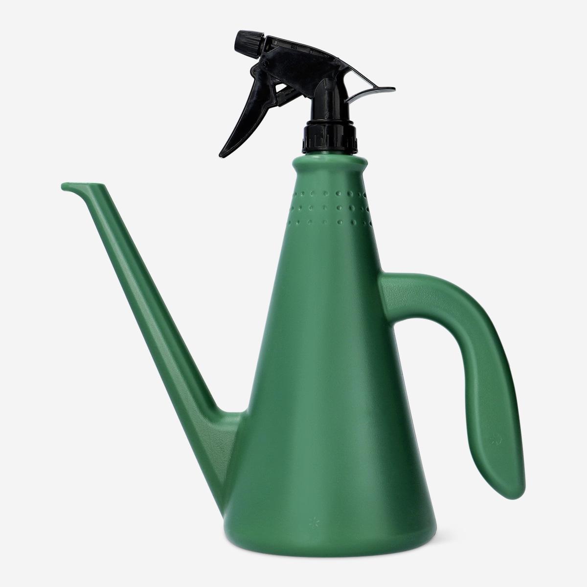 Green watering can. with mist spray