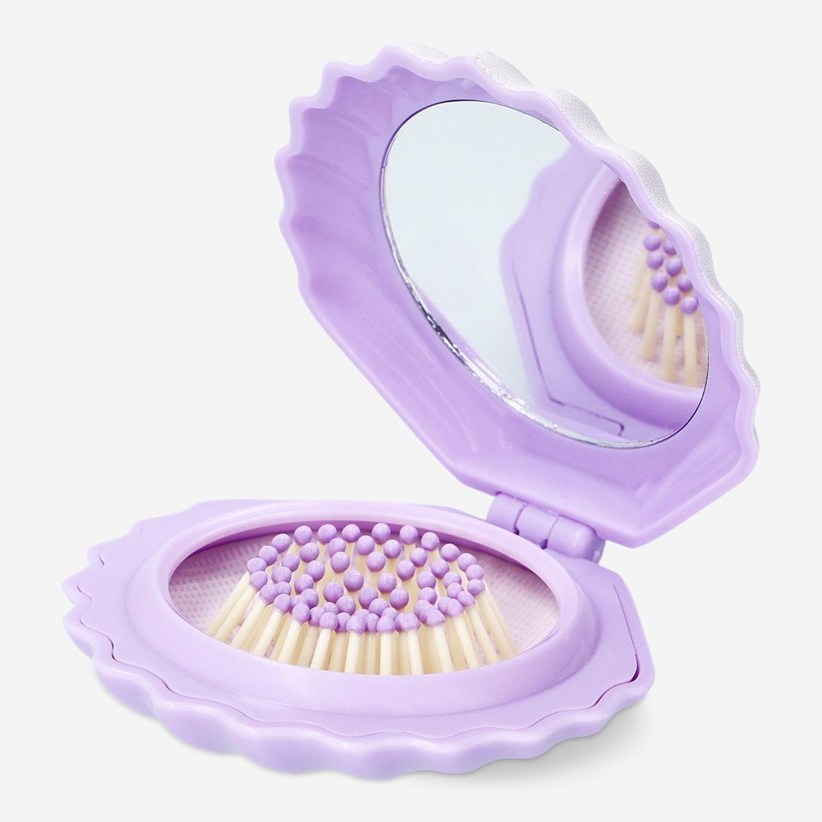 Purple hairbrush and mirror