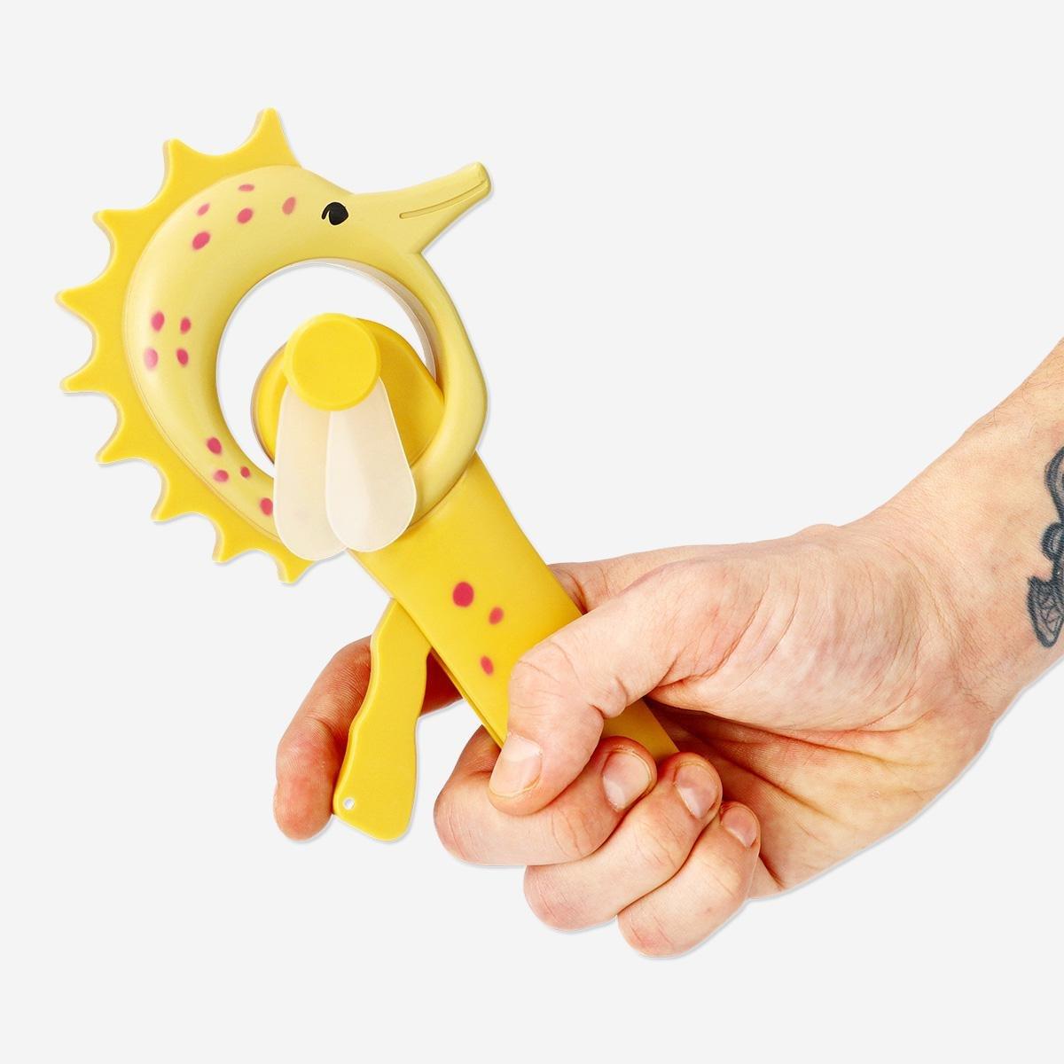 Yellow handheld seahorse fan