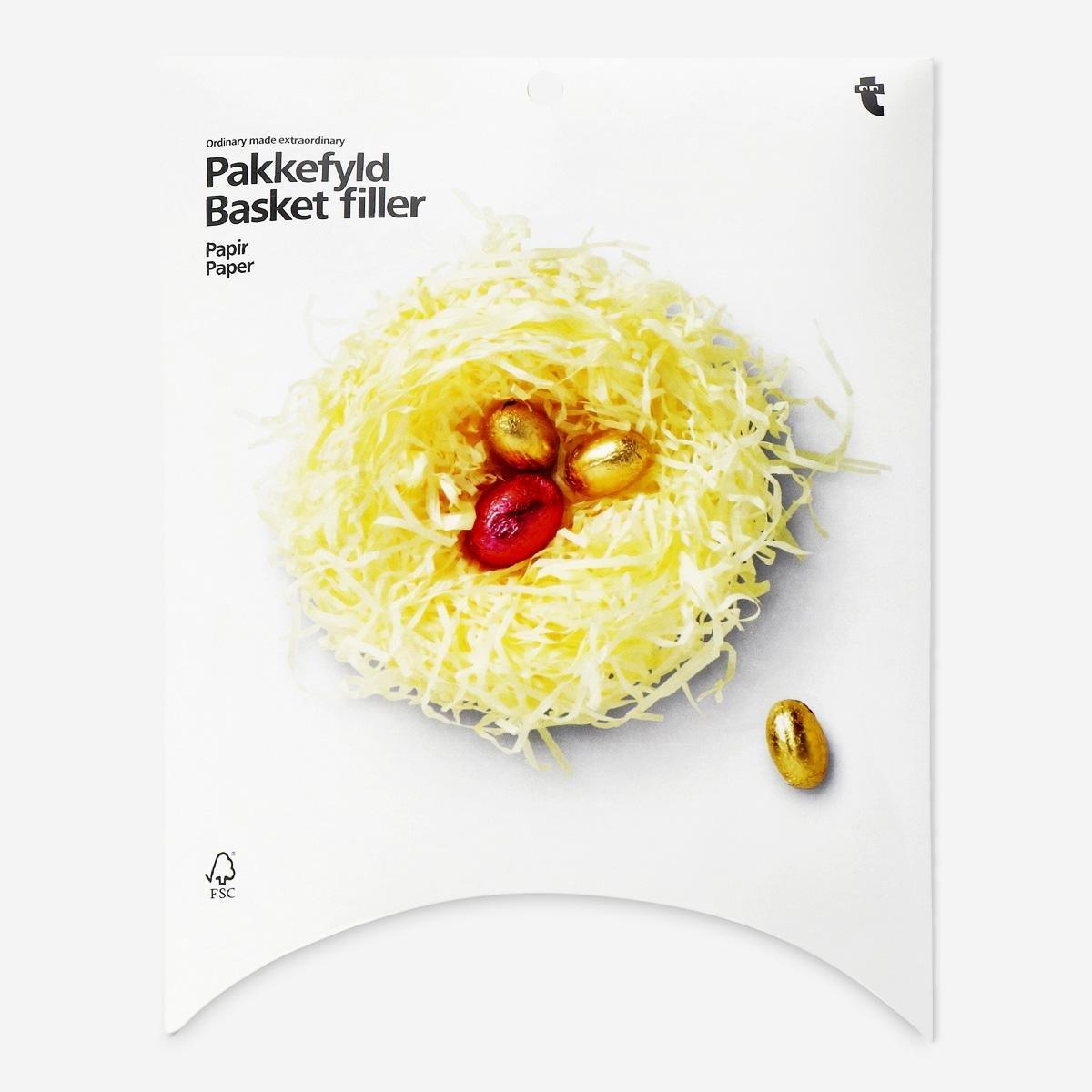 Yellow basket filler. paper