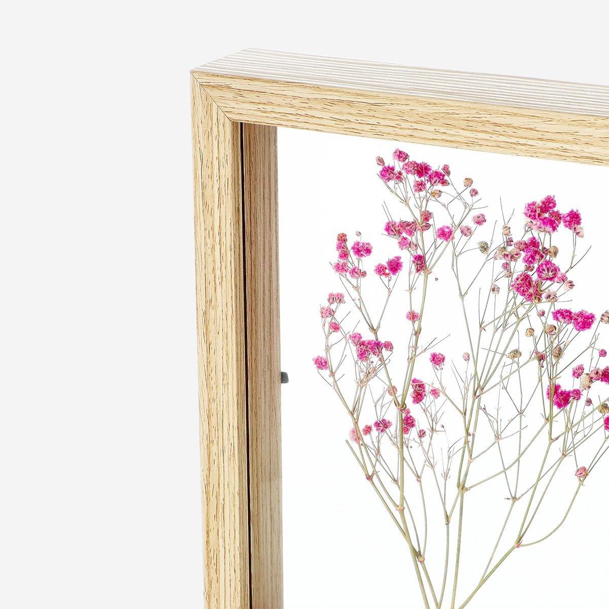 Frame with decorative flower