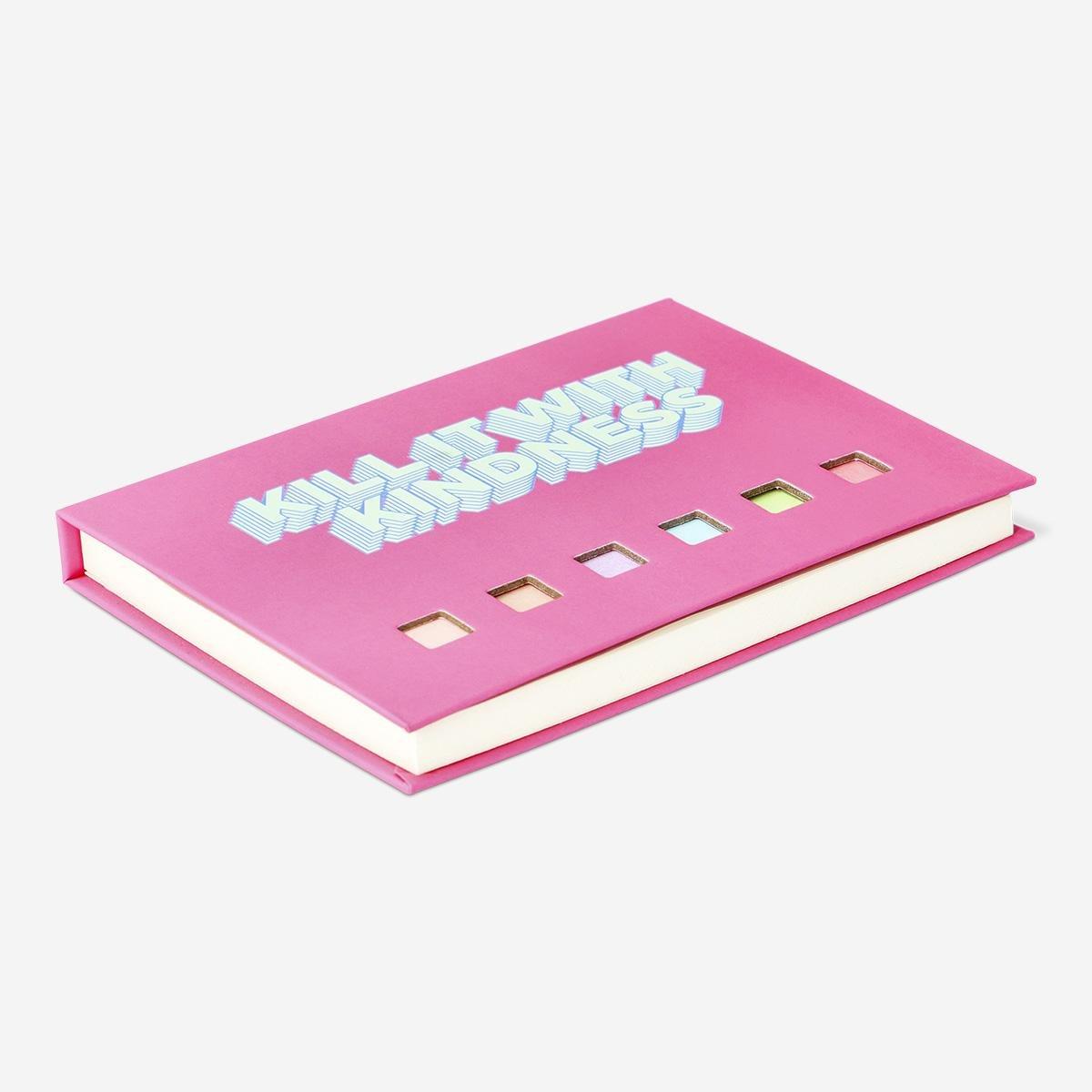 Pink notebook with page markers