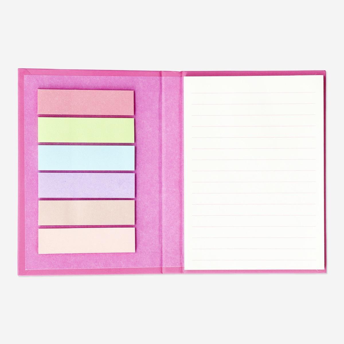 Pink notebook with page markers