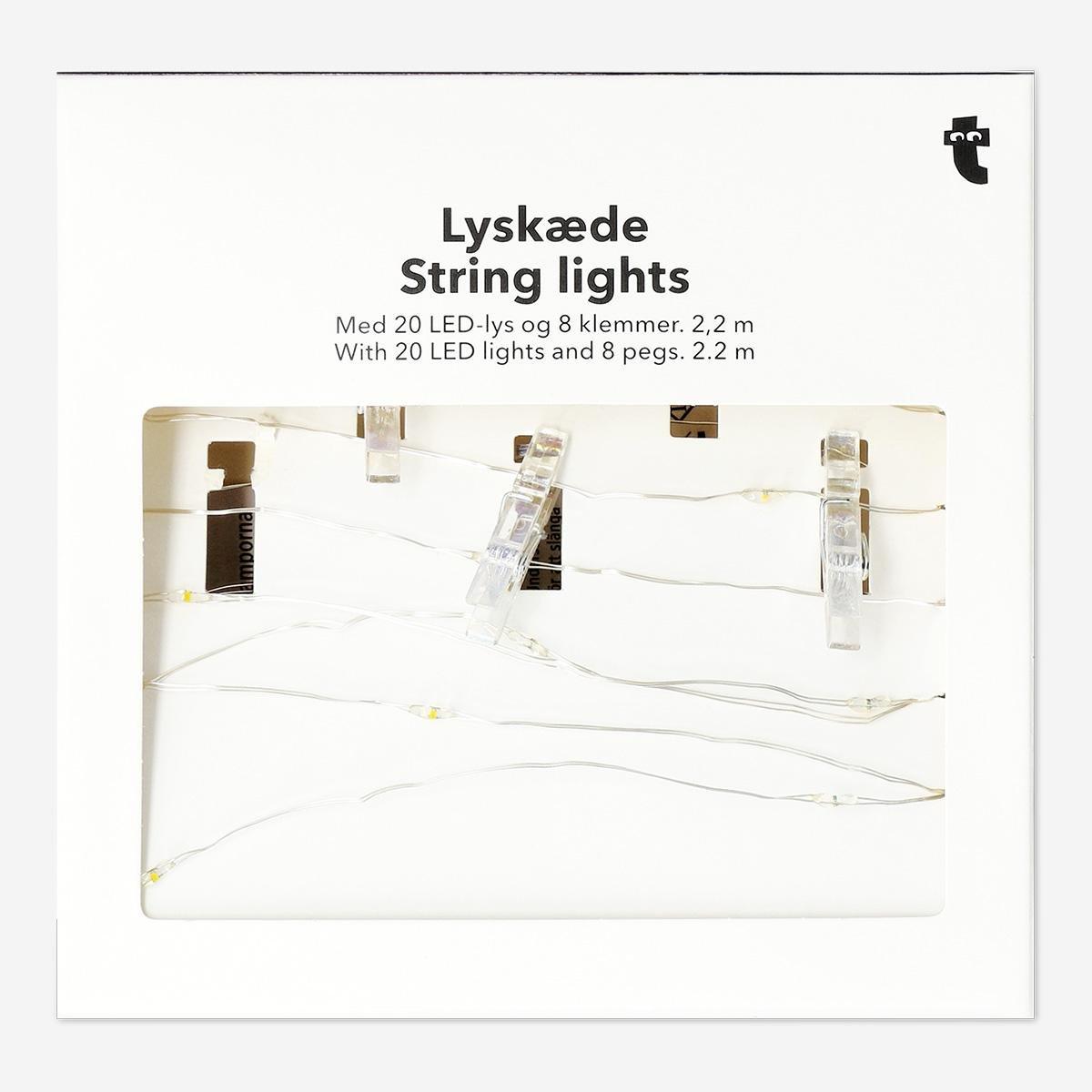 White illuminate string lights. 220 cm