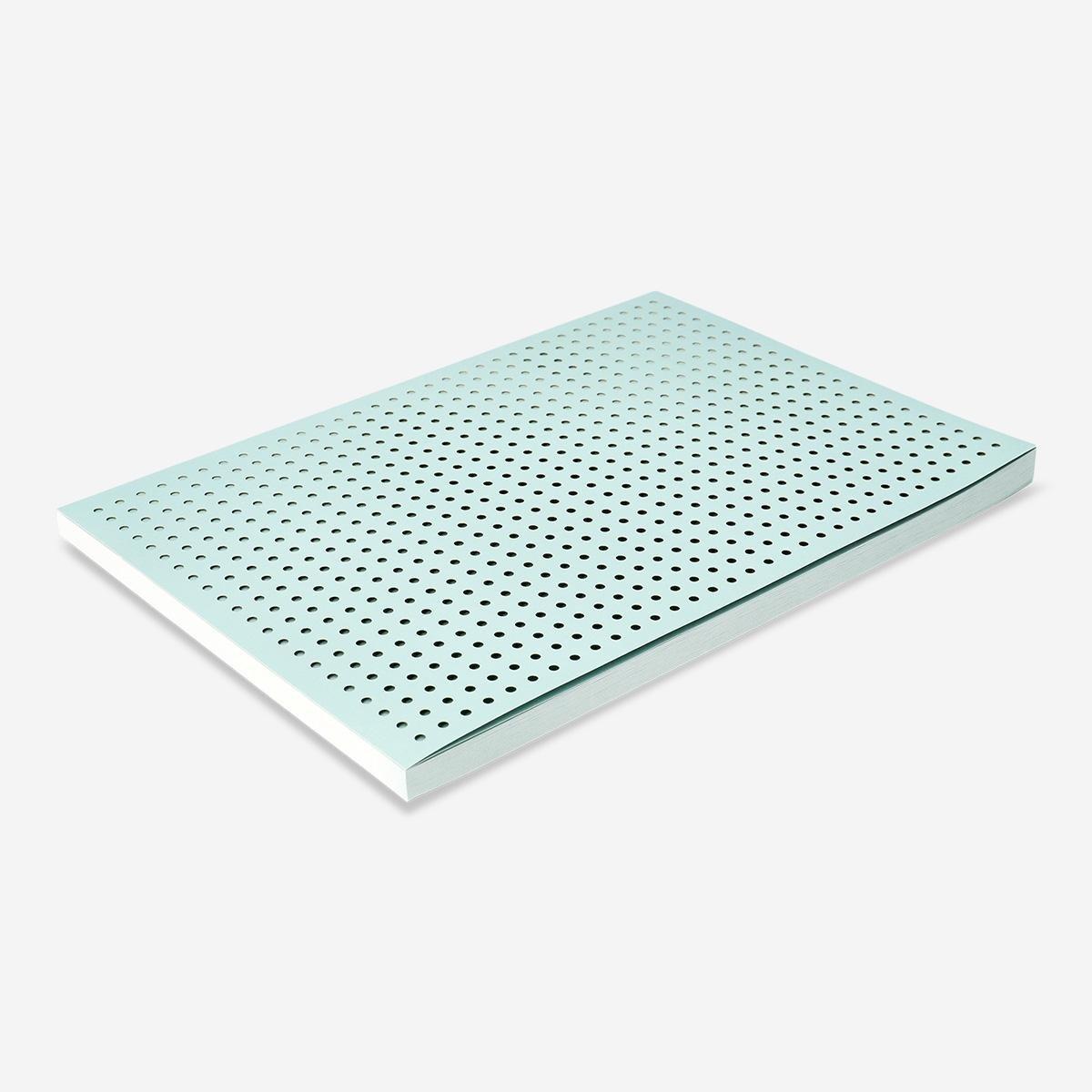 Green hole-punched design notebook. b5