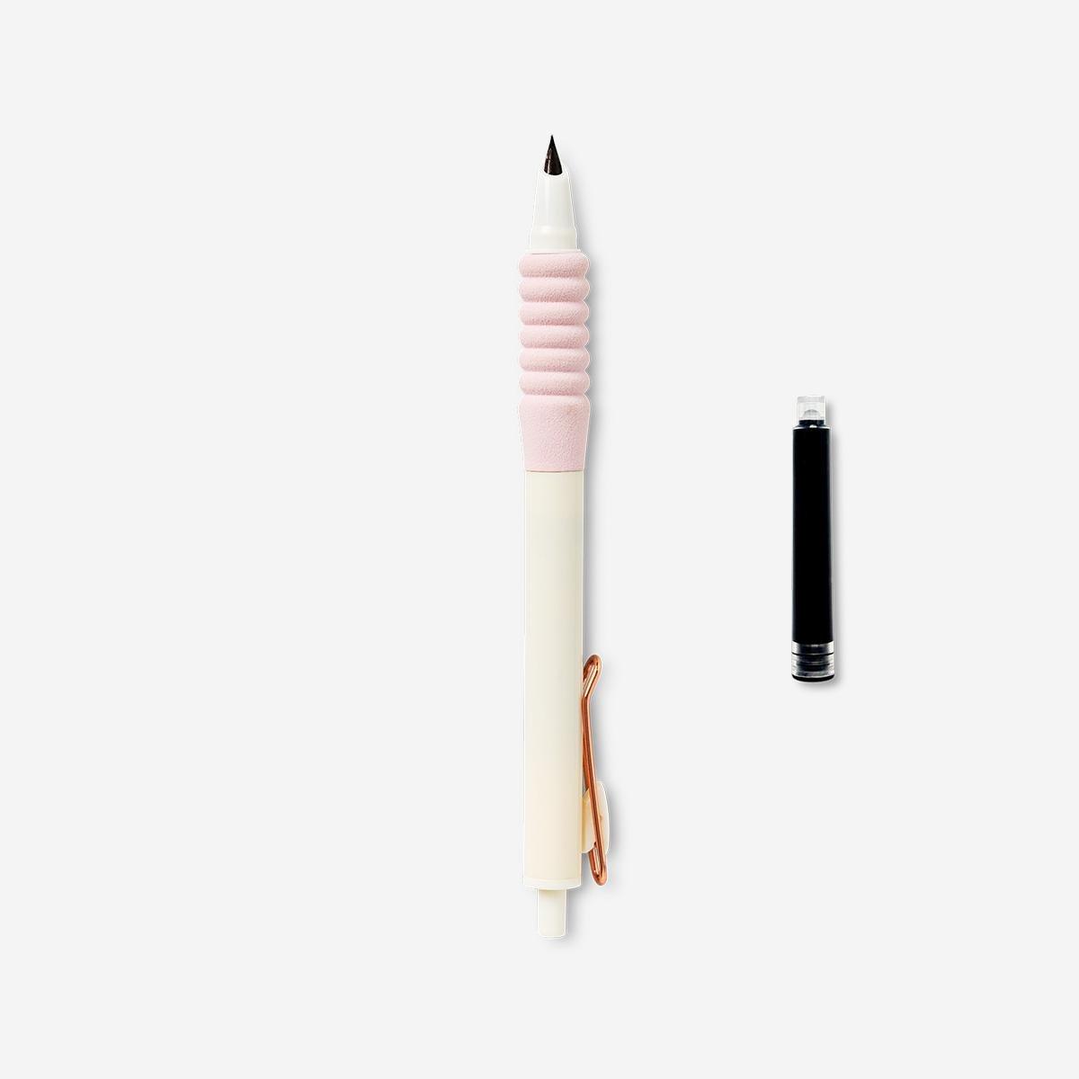 Pink fountain pen with ink