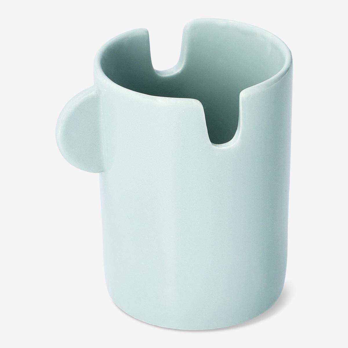 Blue ceramic paintbrush holder