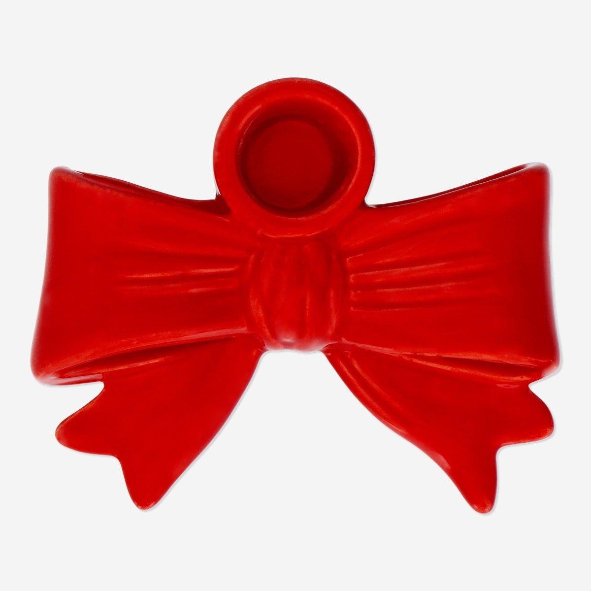 Red bow shaped candle holder