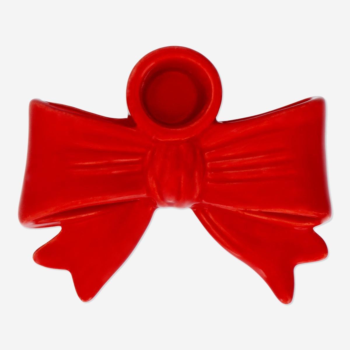 Red bow shaped candle holder