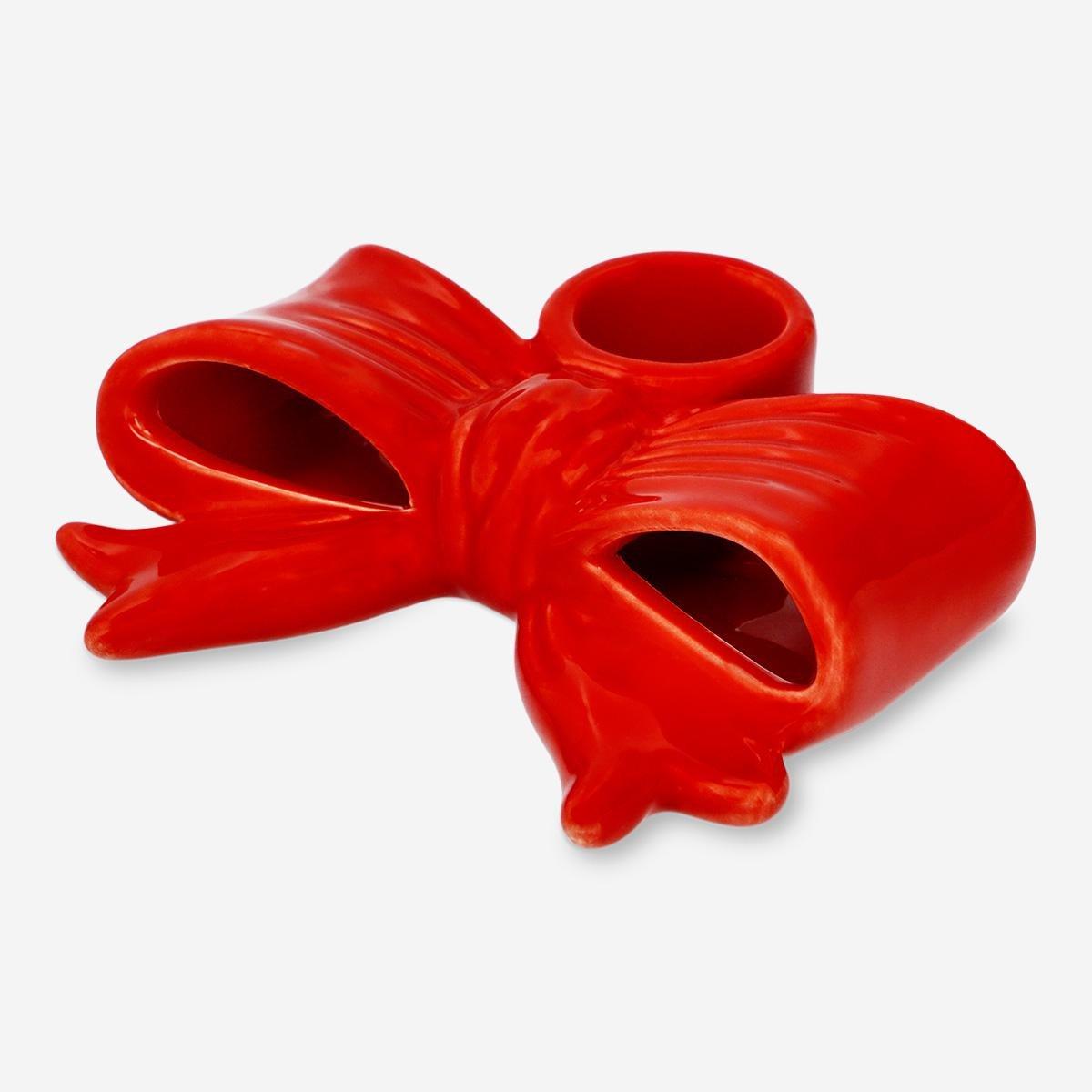 Red bow shaped candle holder
