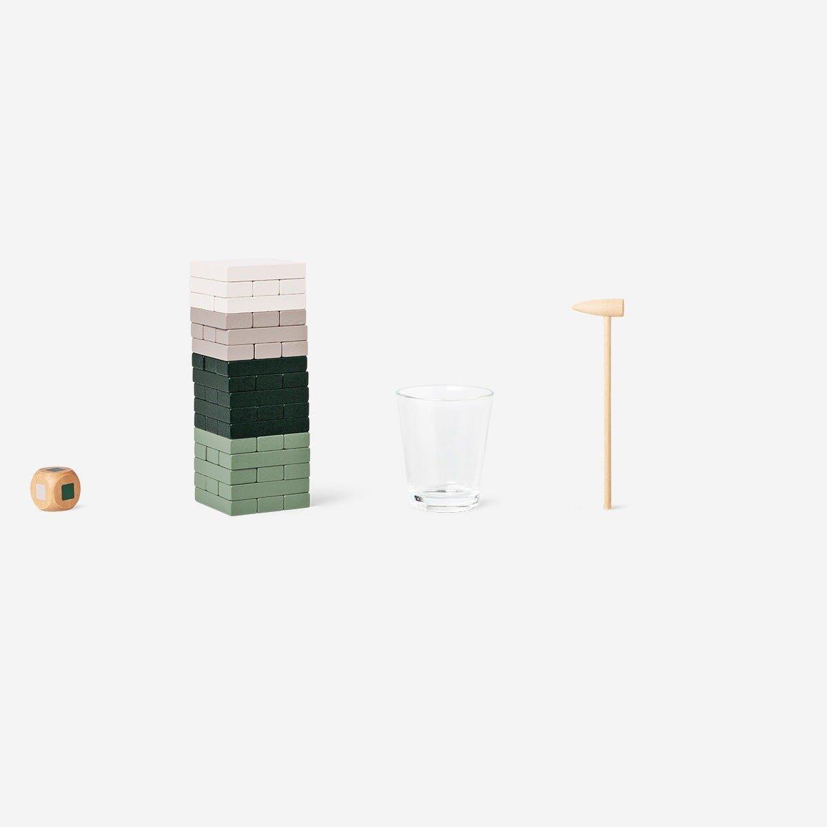 Multicolour stacking tower shot game for two to four players