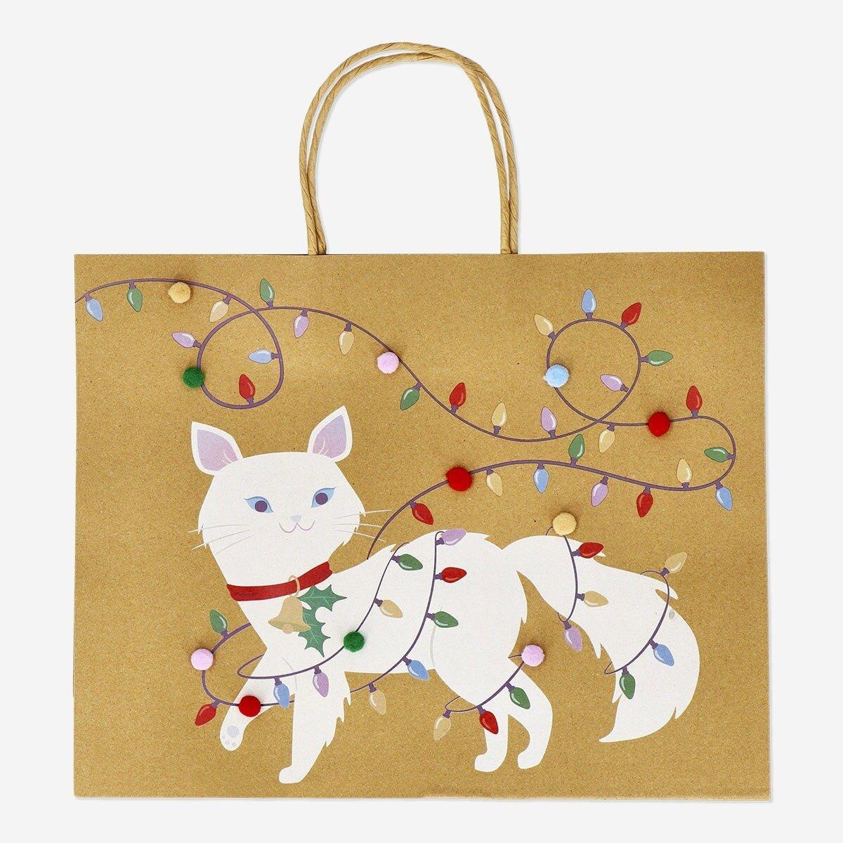 Multicolour gift bag with pom poms