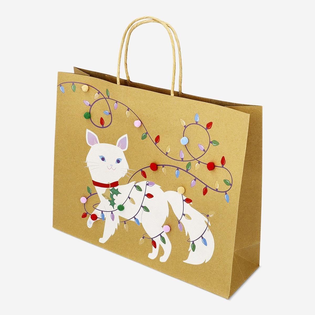 Multicolour gift bag with pom poms