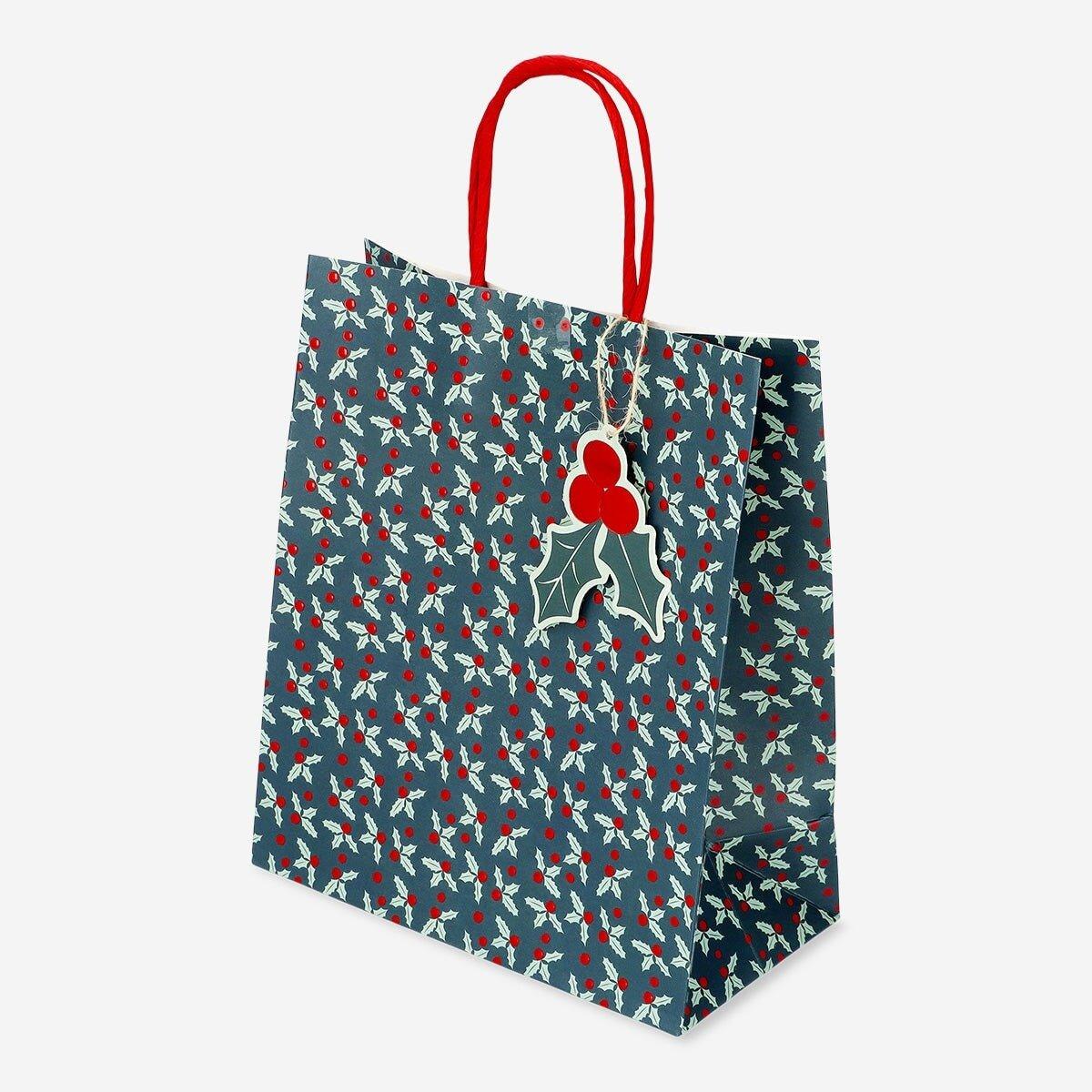 Multicolour gift bag with debossed holly pattern
