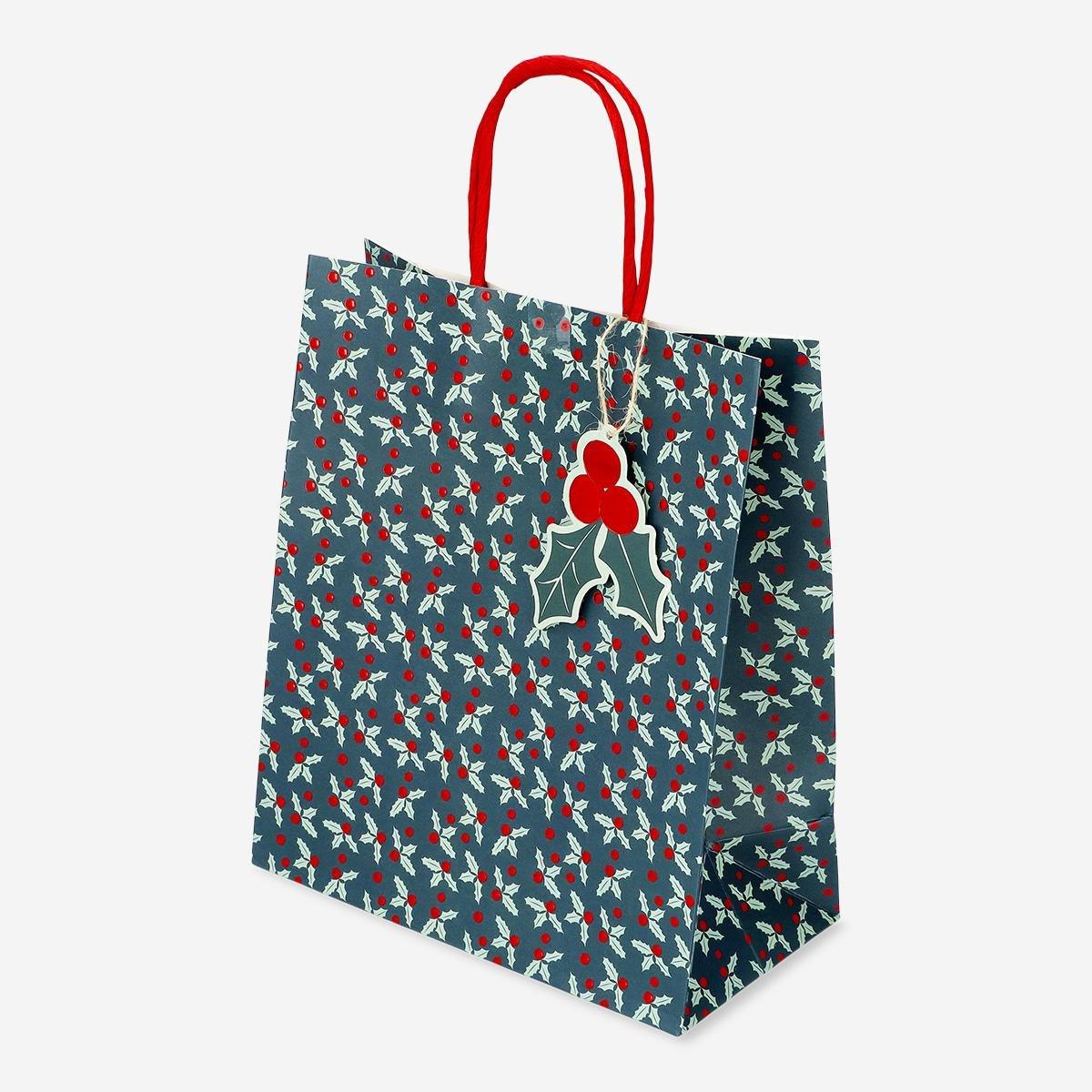 Multicolour gift bag with debossed holly pattern
