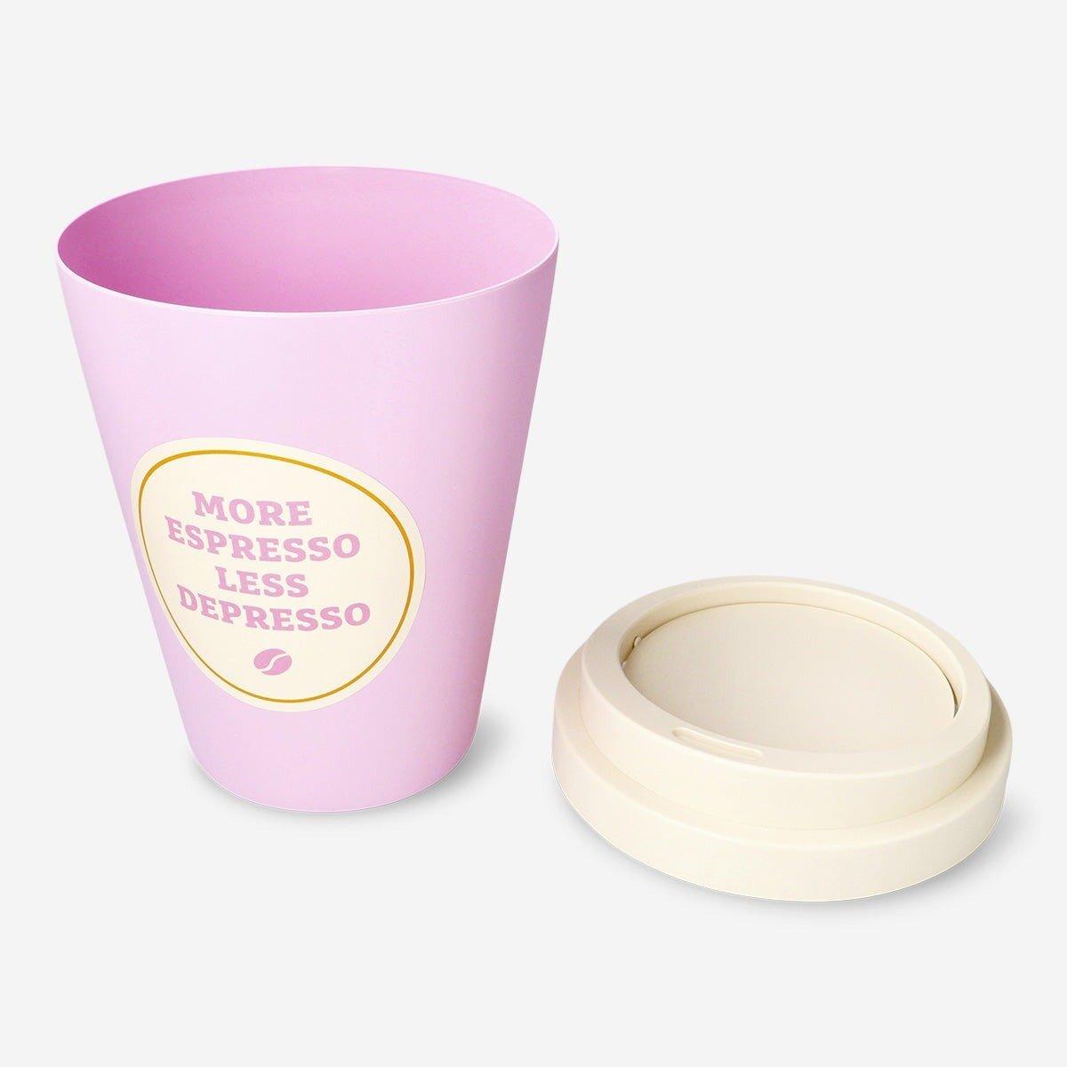 Pink trash can in the shape of a coffee cup