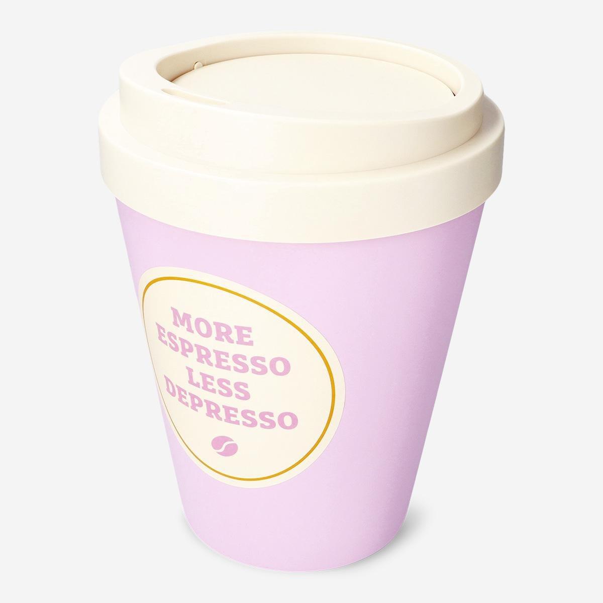 Pink trash can in the shape of a coffee cup