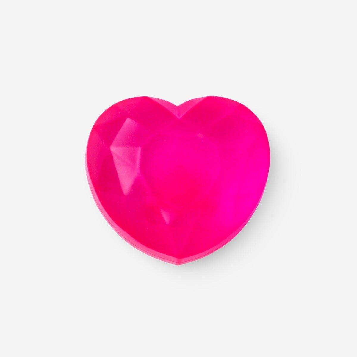 Pink heart-shaped squeeze toy