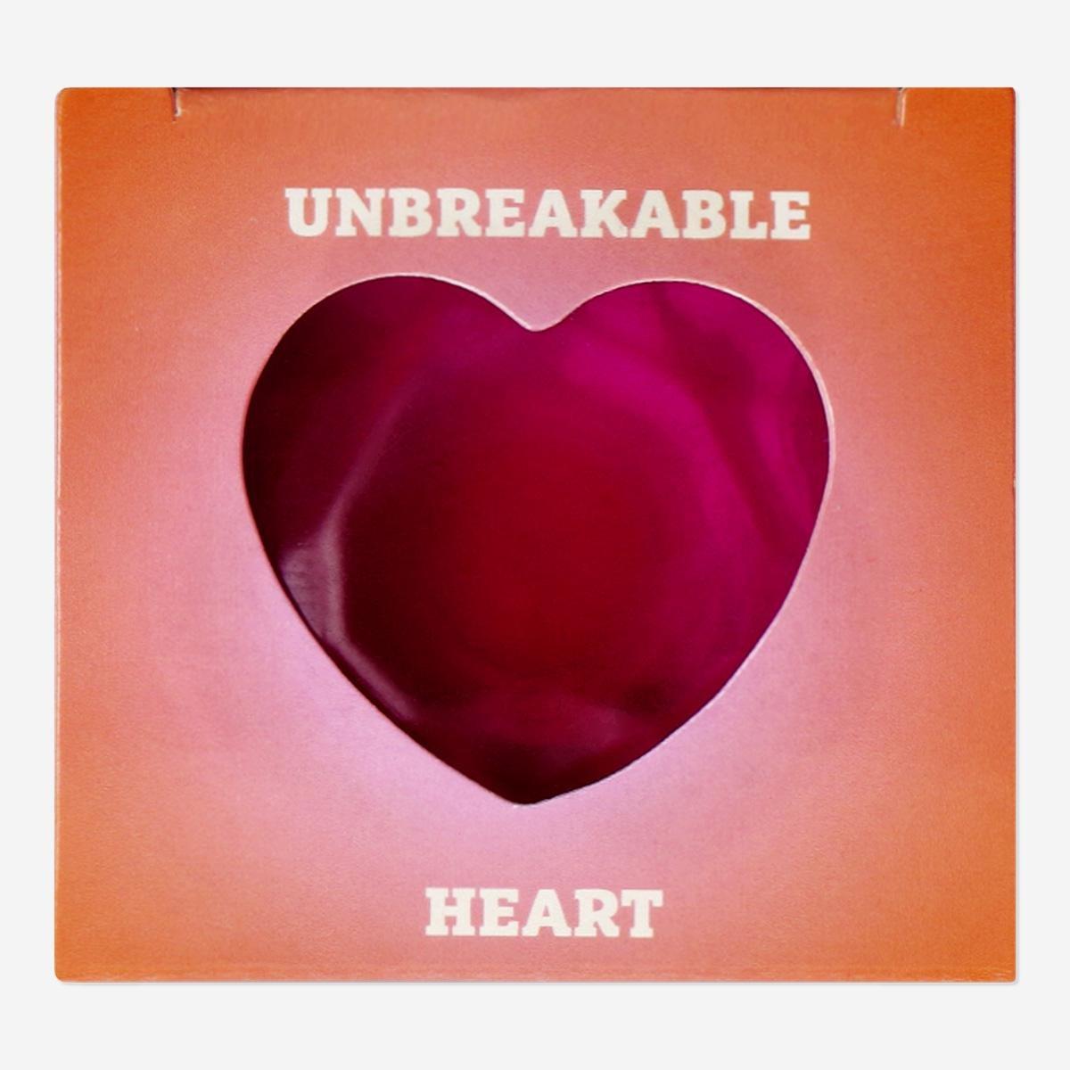 Pink heart-shaped squeeze toy