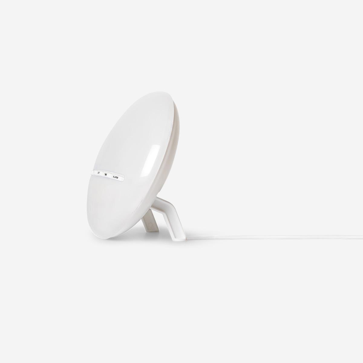 White digital alarm clock with sunrise light