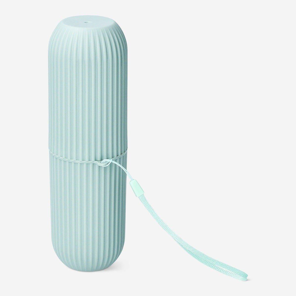 Green travel case for toothbrush