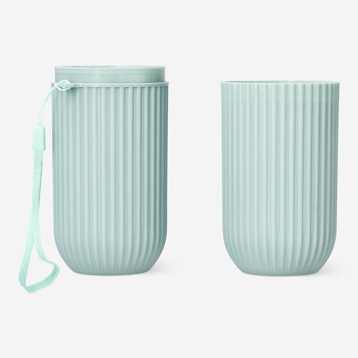 Green travel case for toothbrush