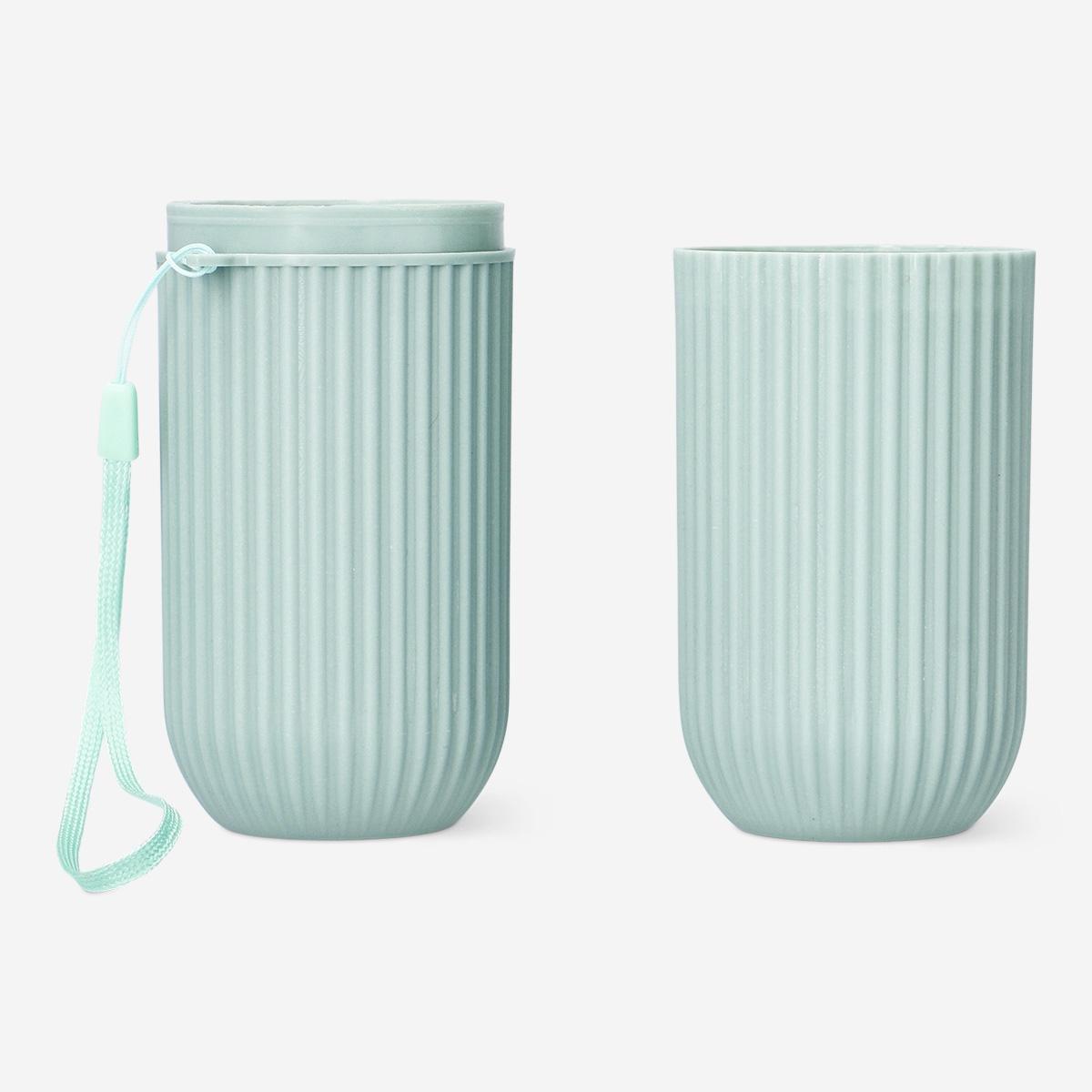 Green travel case for toothbrush