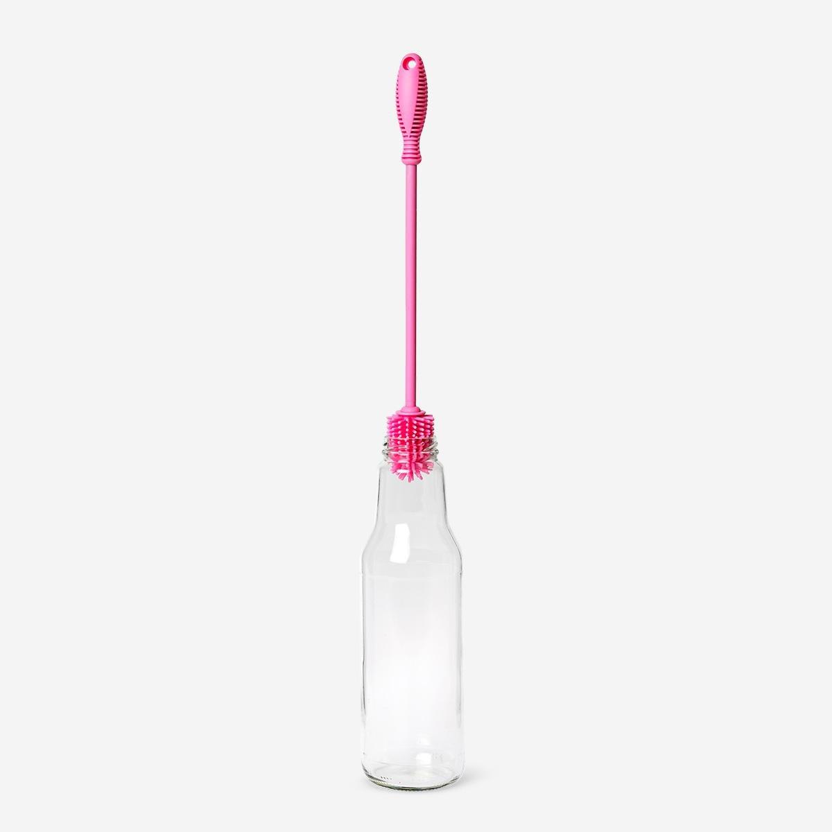 Pink washing up brush for bottles